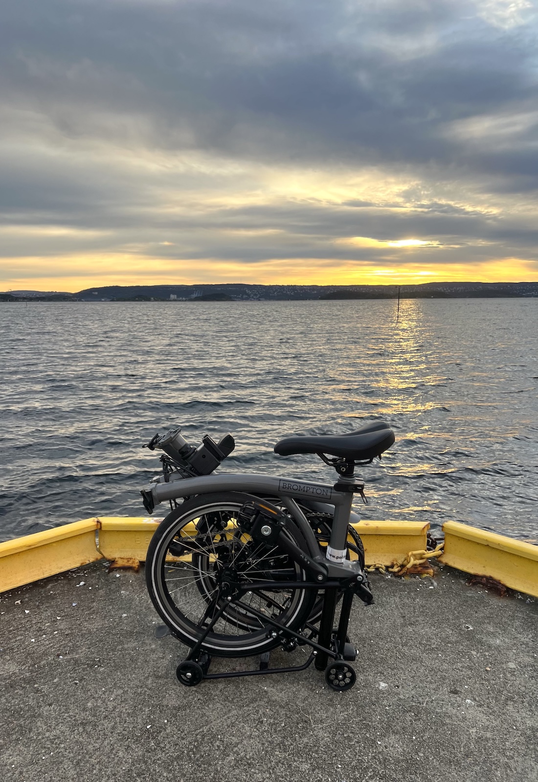 Oslo’s first Brompton P Line Electric by the water at sunset